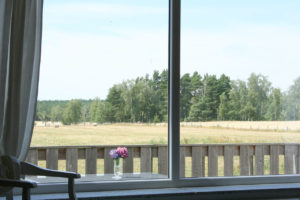 Ausblick auf Felder und Wälder